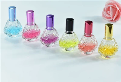 زجاجة عطر على شكل صدفة